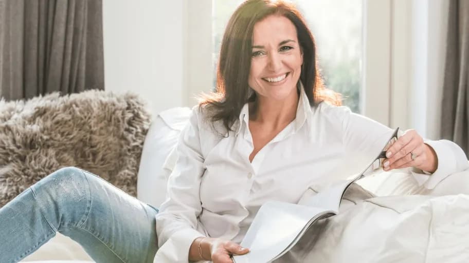 Woman feeling confident and relaxed after learning about menopause treatment options.