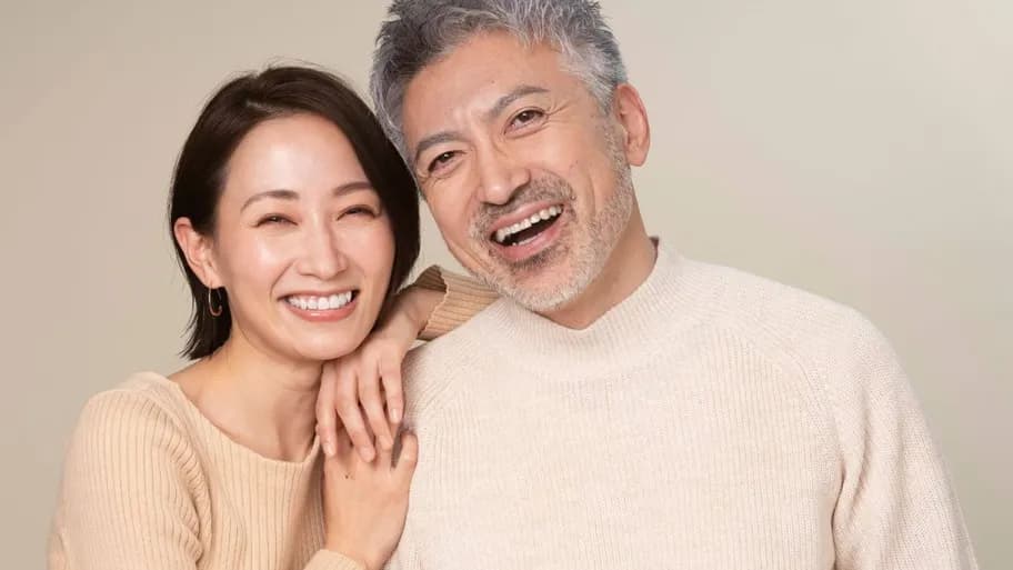 Couple discussing menopause treatment options with a consultant.